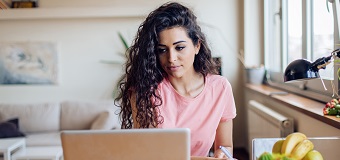 Woman working from her laptop at home