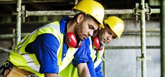 Manager reviewing the work of employee